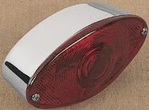 Taillights – TAILLIGHTS - Cat Eye w/ red lens; 12,5 cm W x 60 mm H x 48 mm D (5” x 2 / ” x 1 / ”)